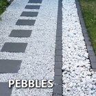 Mix different types of pebbles and pavers for dramatic effect